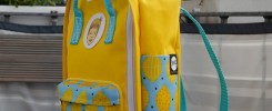 Kinderrucksack in Gelb und Hellblau mit Zitronenmuster